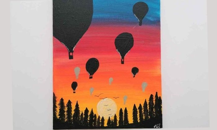 Heißluftballons bei Sonnenaufgang